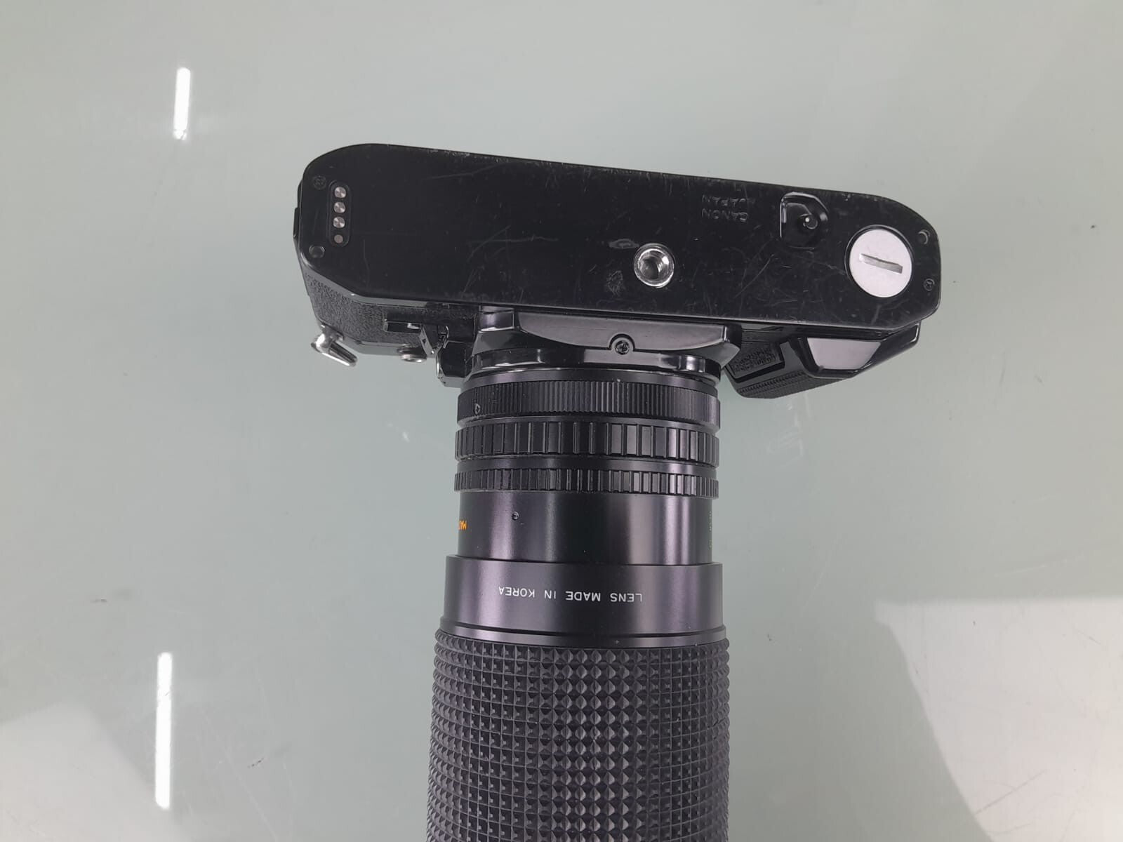 CANON A 1 SLR CAMERA WITH SIRIUS F=28-200MM 1:4.0-5.6 LENS