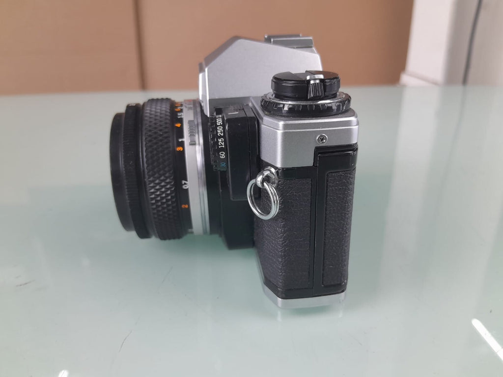 OLYMPUS OM 10 SLR CAMERA WITH ZUIKO MC AUTO-S 1:1.8 F=50MM LENS