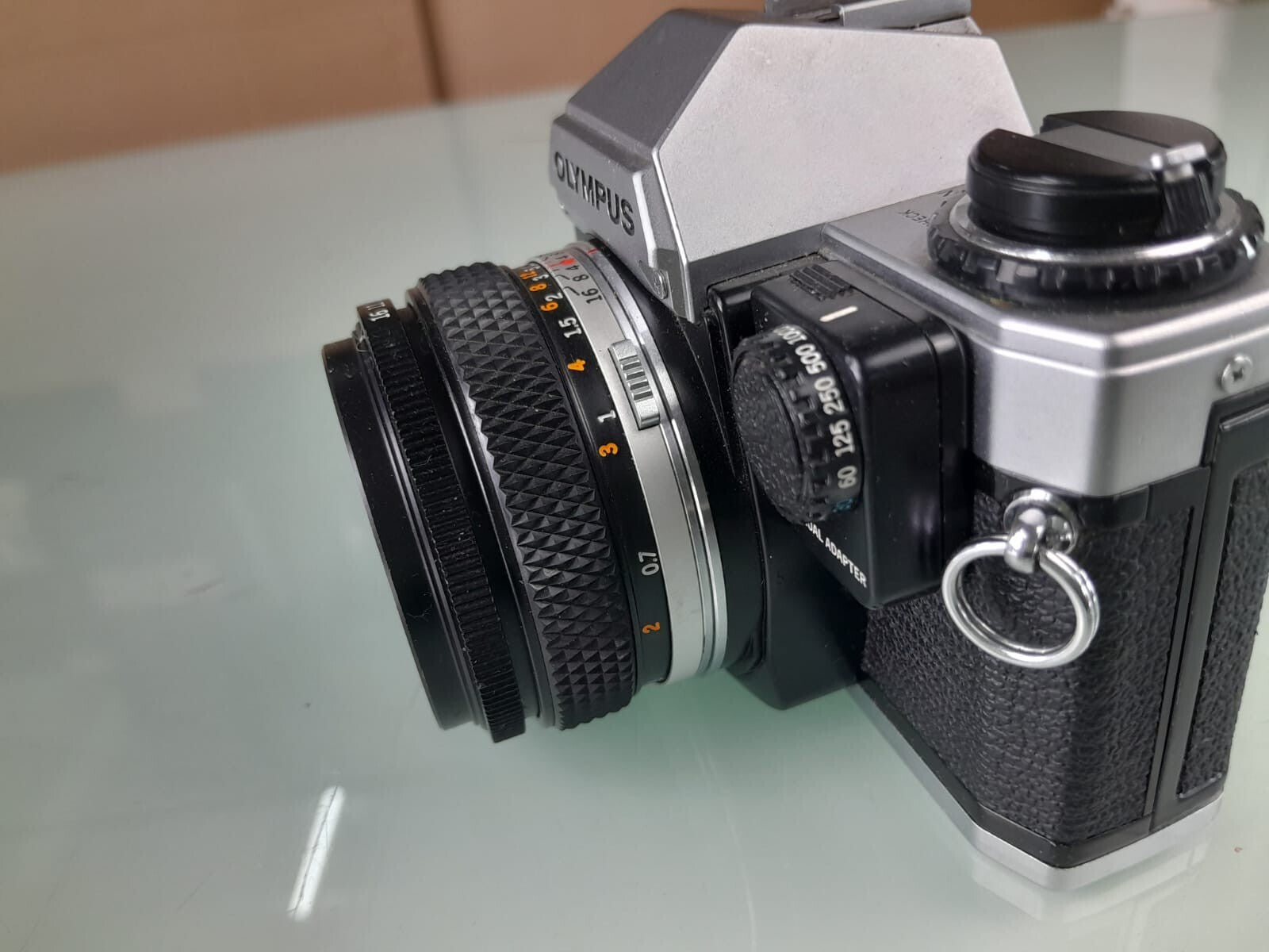 OLYMPUS OM 10 SLR CAMERA WITH ZUIKO MC AUTO-S 1:1.8 F=50MM LENS