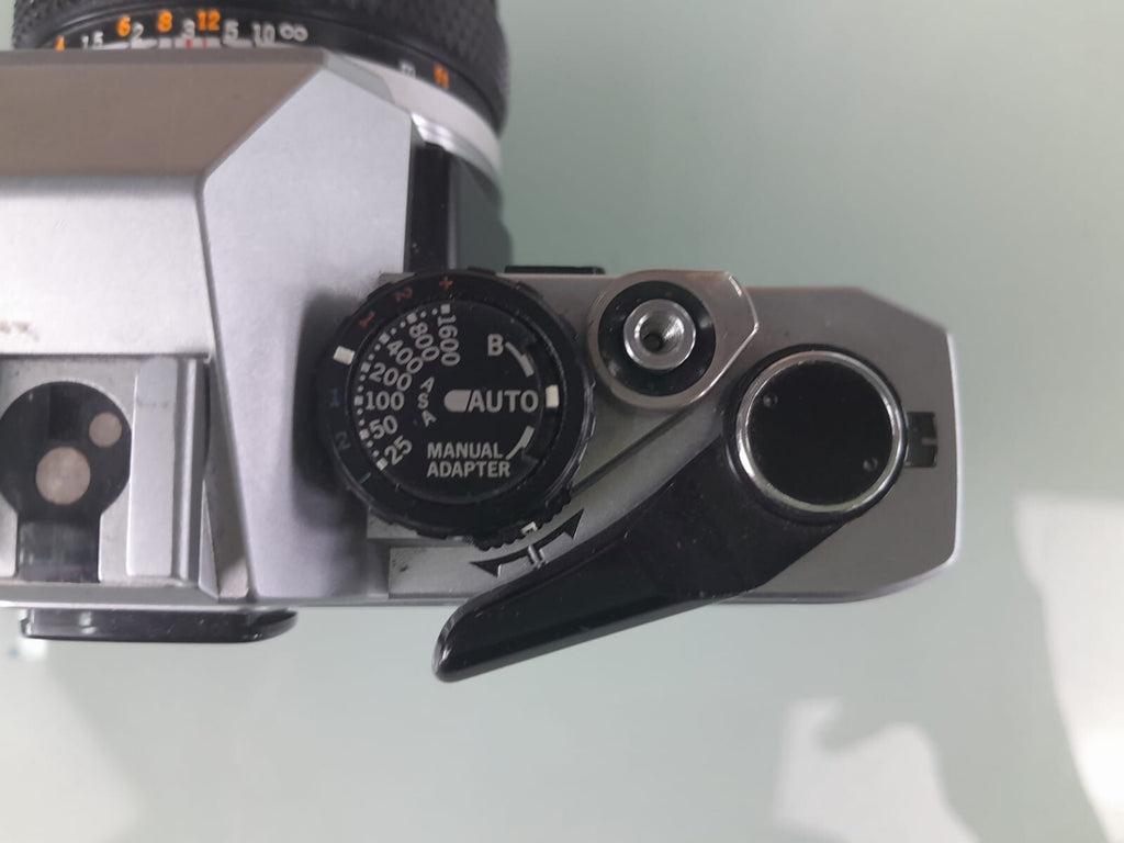 OLYMPUS OM 10 SLR CAMERA WITH ZUIKO MC AUTO-S 1:1.8 F=50MM LENS