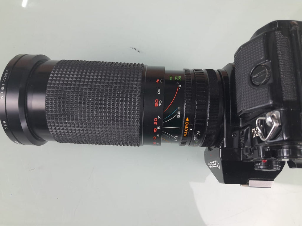 CANON A 1 SLR CAMERA WITH SIRIUS F=28-200MM 1:4.0-5.6 LENS