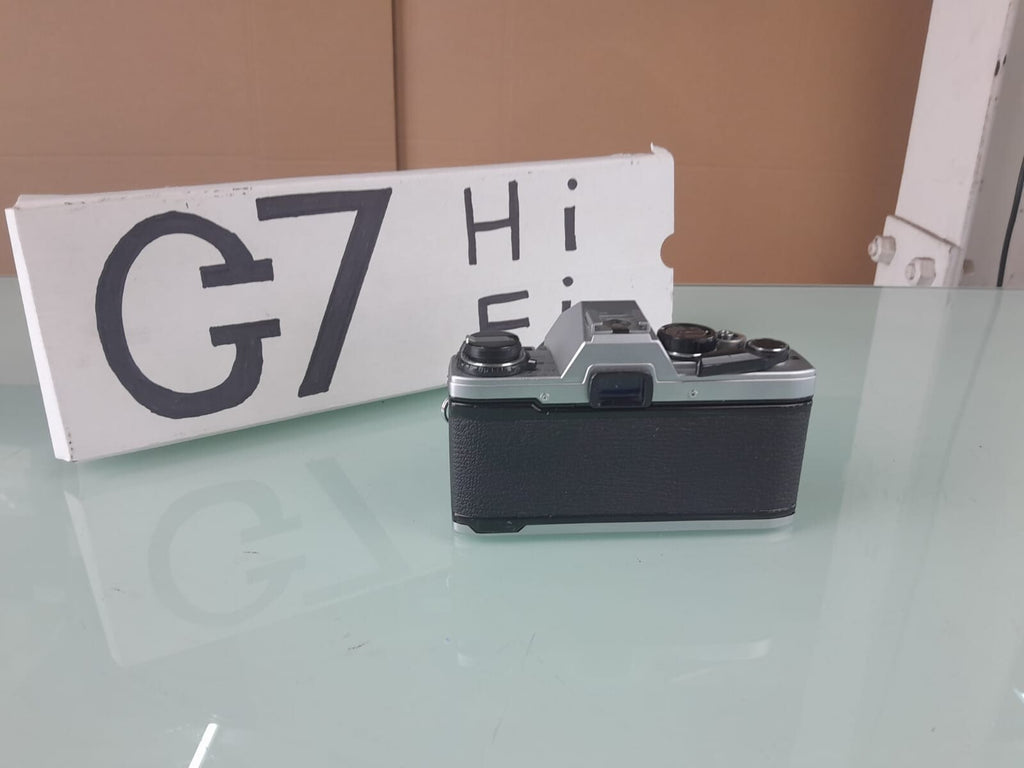 OLYMPUS OM 10 SLR CAMERA WITH ZUIKO MC AUTO-S 1:1.8 F=50MM LENS