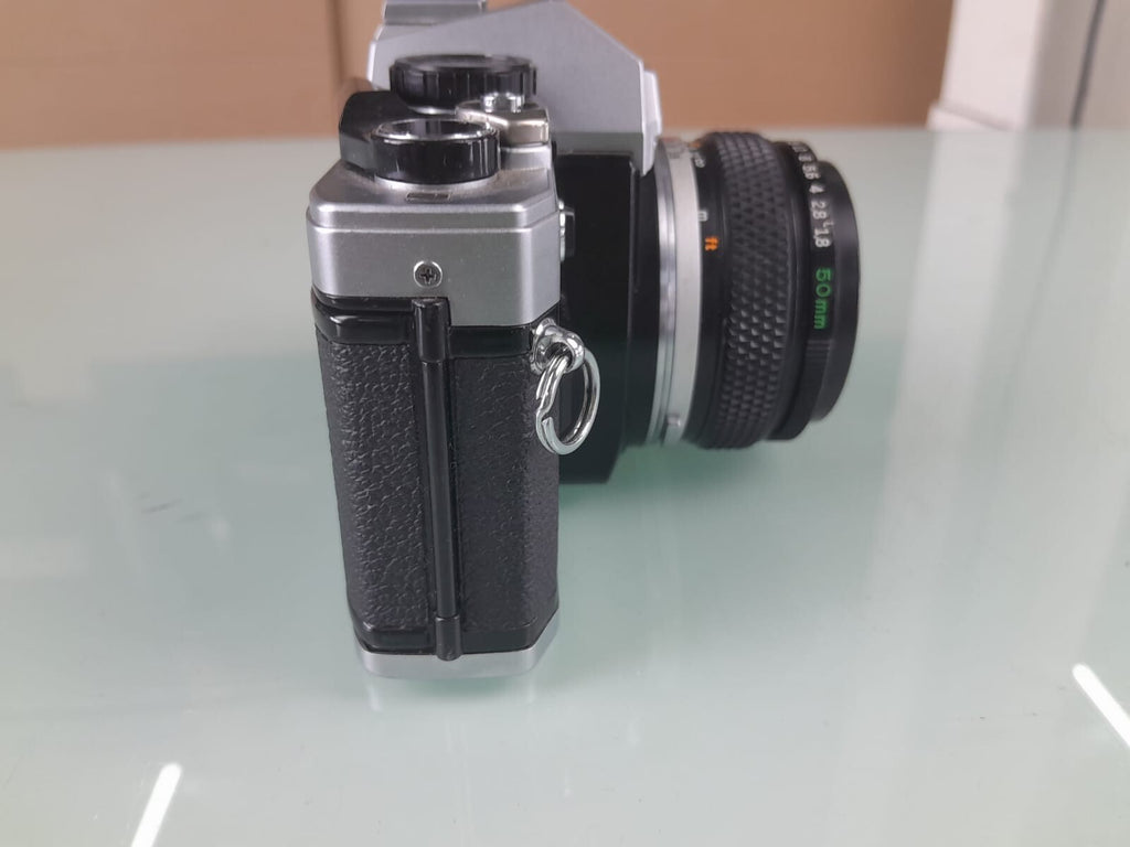 OLYMPUS OM 10 SLR CAMERA WITH ZUIKO MC AUTO-S 1:1.8 F=50MM LENS